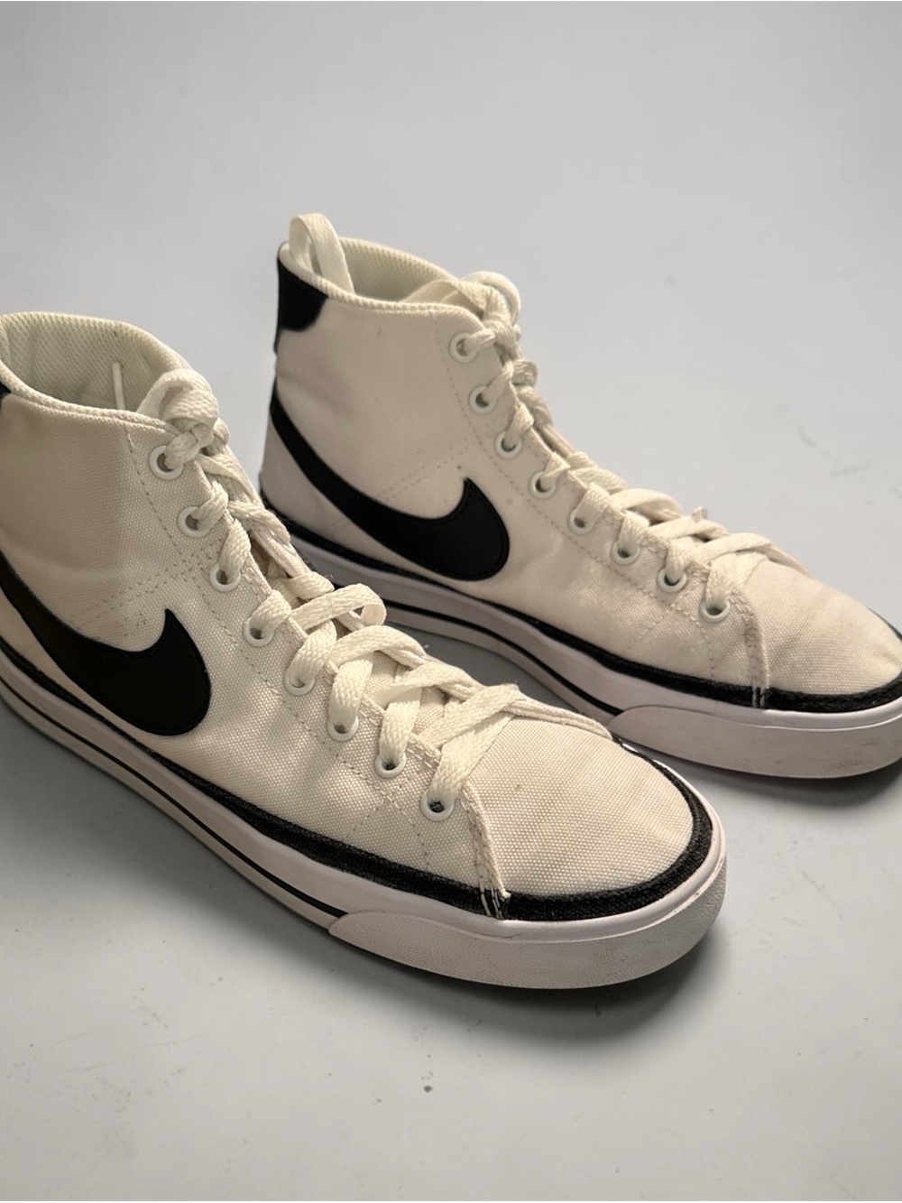 Nike Men’s High-Top Sneakers in Cream with Black Swoosh
